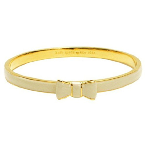 kate spade Jewelry - Kate spade take a bow bangle bracelet cream/gold